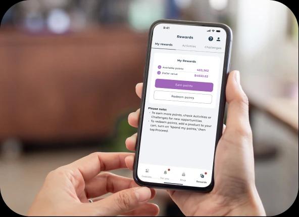 Hands holding a phone displaying the Lexie app with Lexie Rewards Points on the screen.