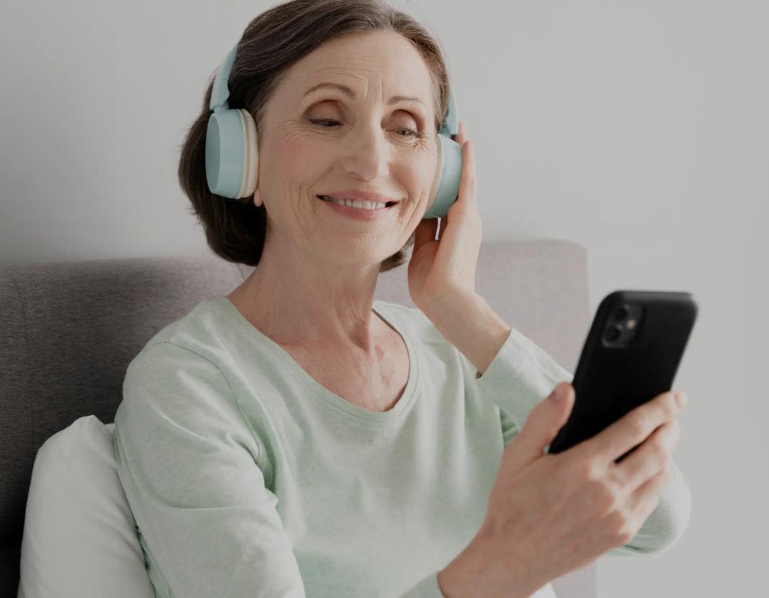 Women taking Lexie 2-minute hearing test.
