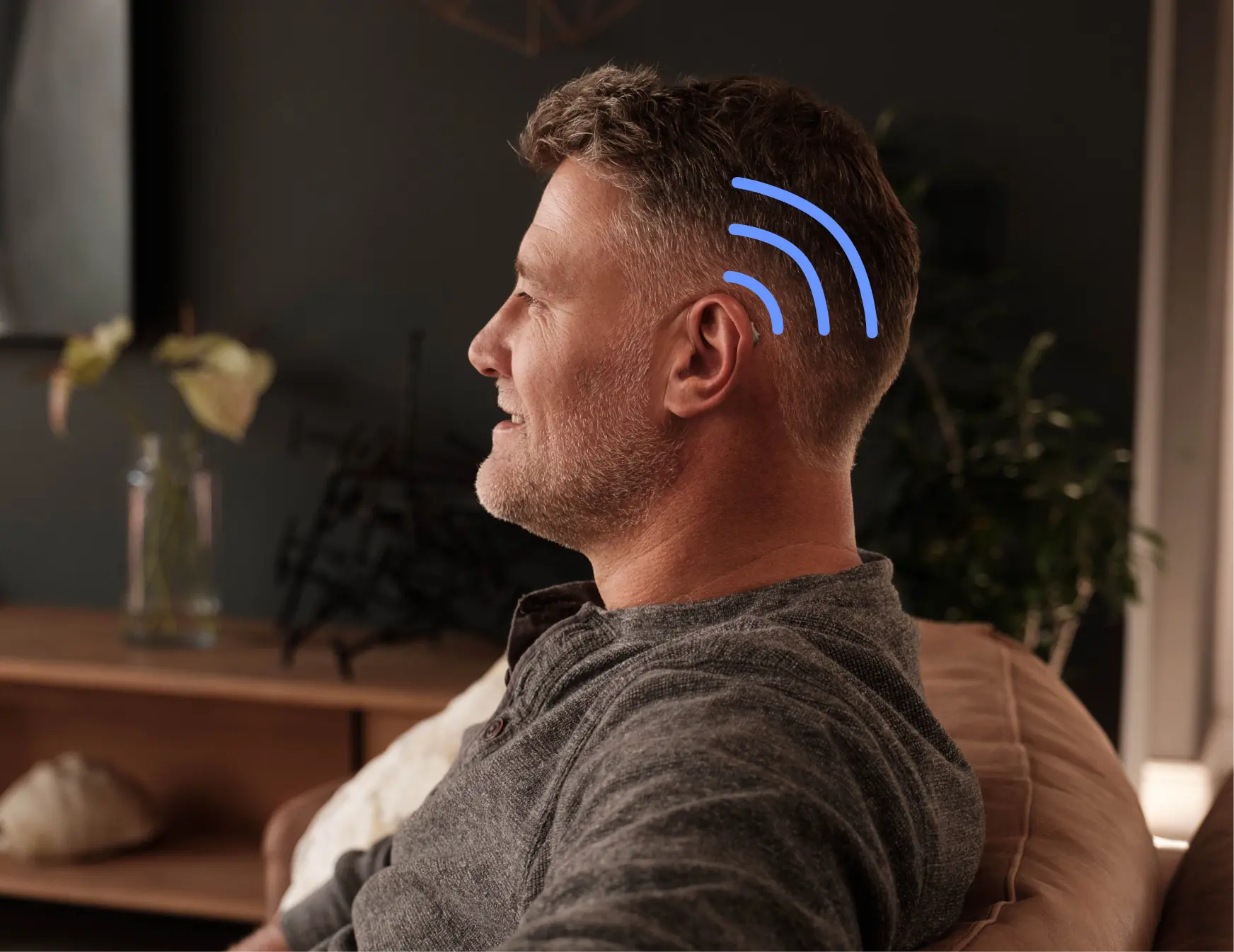 Man wearing Lexie B2 Powered by Bose hearing aids