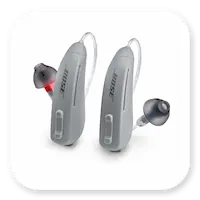 Lexie B1 Product | Two hearing aids standing up thumbnail.
