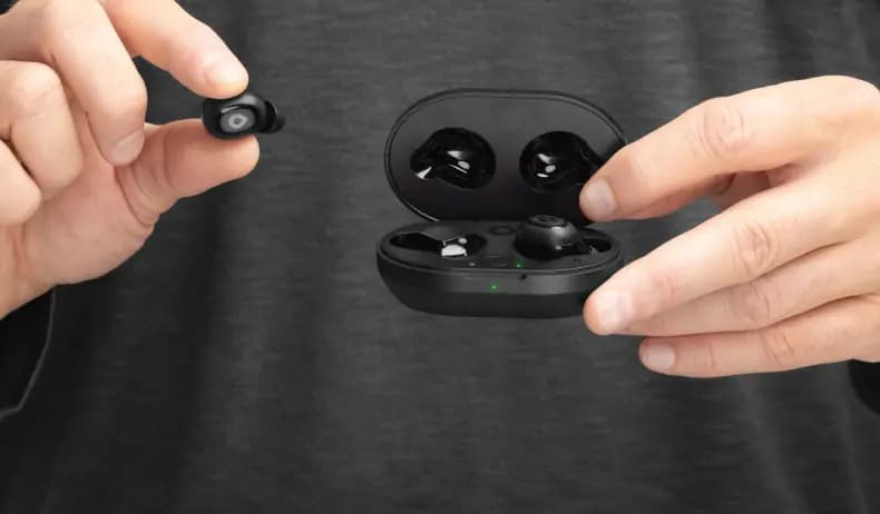 Image of Lexie H1 hearing buds being shown in their charging case