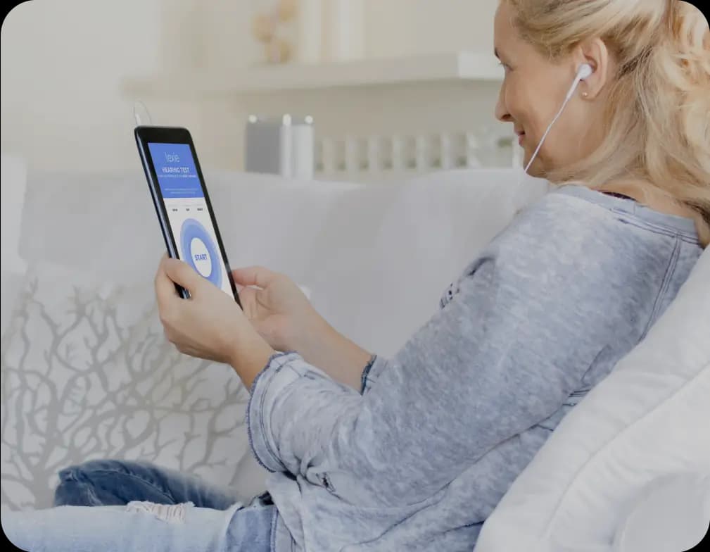 Women taking Lexie 3-Minute hearing test.