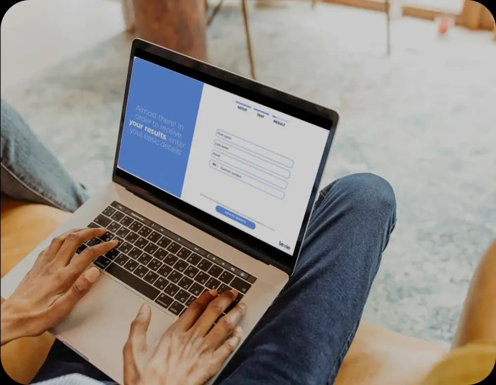 Laptop displaying Lexie 3-Minute hearing test.